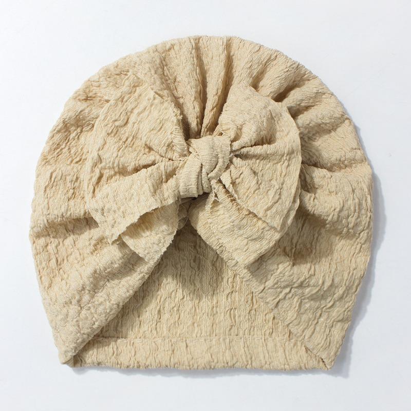 Neue Kinder-Überziehmütze, niedliche Schleifen-Babymütze, weiche und atmungsaktive Baby-Reifenmütze