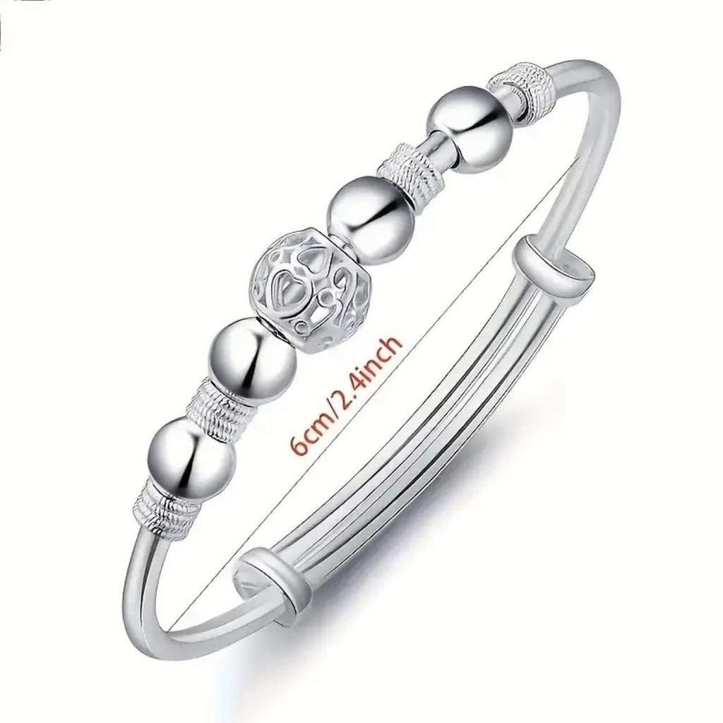European-Style Silver-Plated Rotating Bead Bracelet for Women: Hollow Exquisite Ball Ornament Jewelry