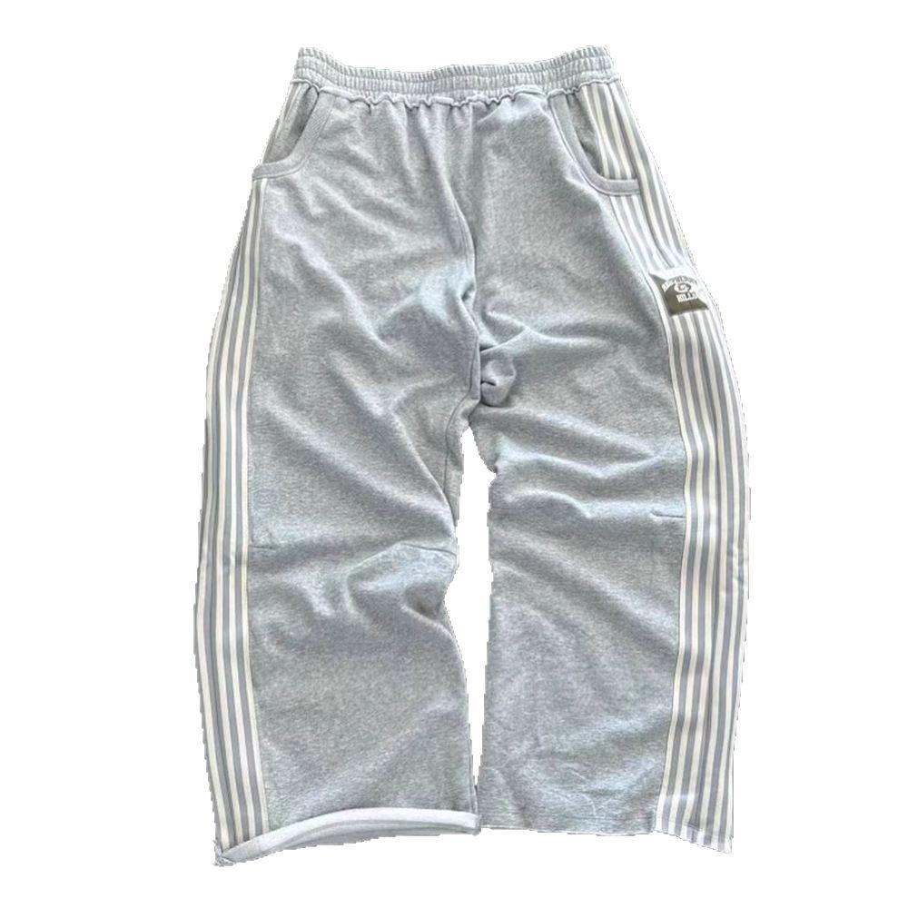 Unisex volné pruhované tepláky širokého střihu