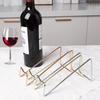 4pcs Elegant Black Iron Wine Bottle Holders Space-Saving Tabletop Wine Rack for Kitchen & Dining Decor Home Kitchen Organizer