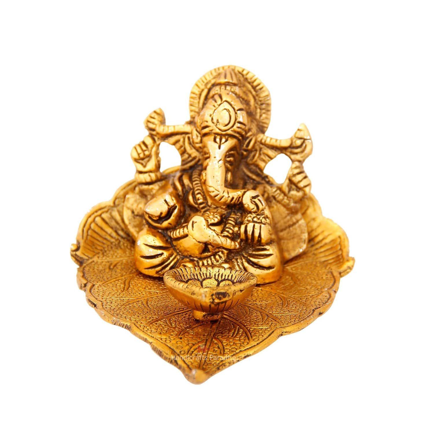 

Металлический Дия в форме листа Пипала с фигуркой Ганеши, Золотой, 4,25 X 3,75 X 2,5 дюйма, 1 шт. золотистый