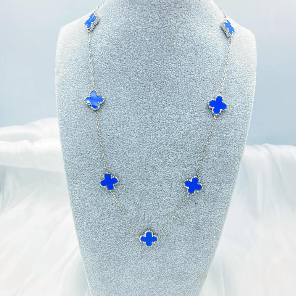Collier de fleurs de trèfle à quatre feuilles pour la mode féminine, tempérament de luxe léger, chaîne de pull haut de gamme à sept fleurs