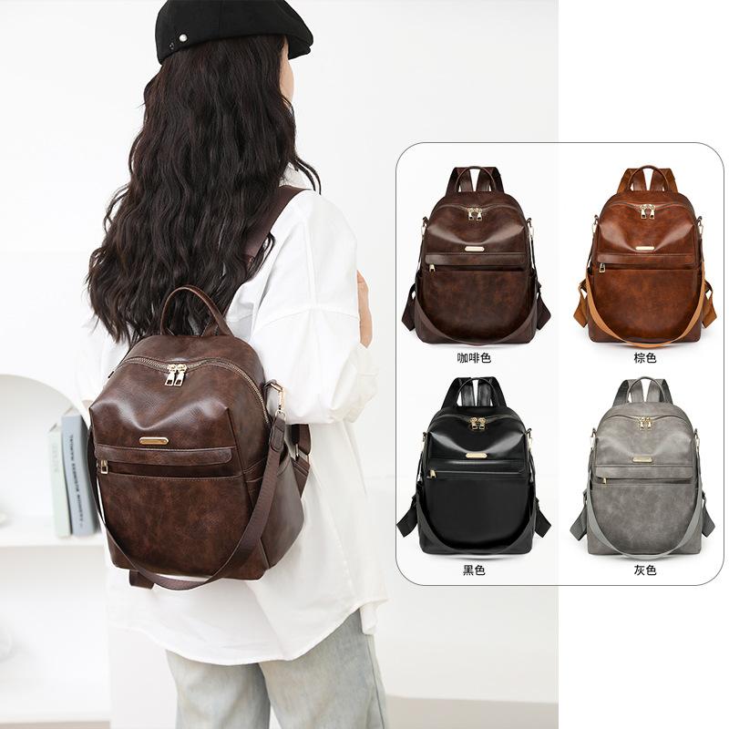 Retro soft leather backpack women's new fashion trend backpack student simple shoulder travel bag