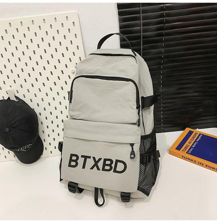 School bag Outdoor sports and leisure Large capacity backpack Couple model Commuter mountaineering bag Versatile college student computer class bag
