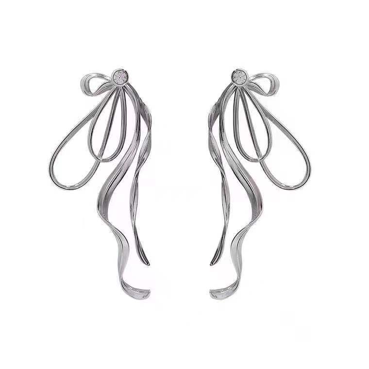 Bow stud earrings women s new foreign style niche design temperament advanced cold sense exaggerated earrings