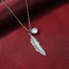 Vintage Feather Pendant Necklace with Sparkling Round Stone Accent Elegant Nature Inspired Jewelry for Women