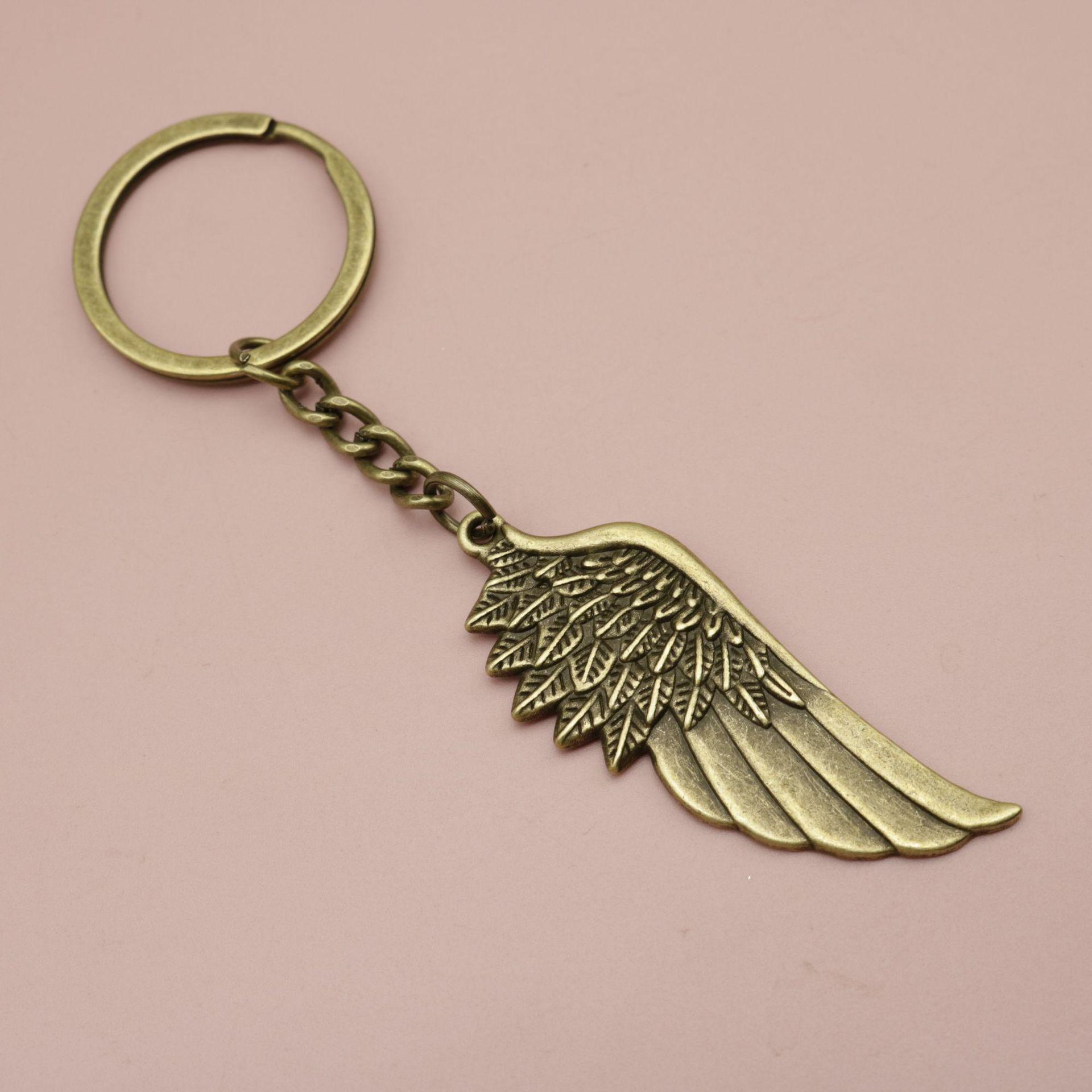 Xiyin Hot Selling Simple Feather Wing Keychain Pendant