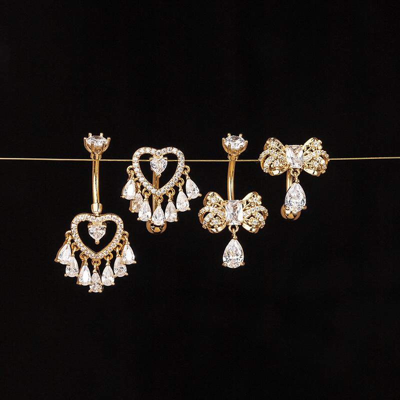 Anneaux de nombril en forme de cœur avec nœud et zircon, piercing de nombril avec pompons en strass, barre de nombril pour femmes, bijoux de corps