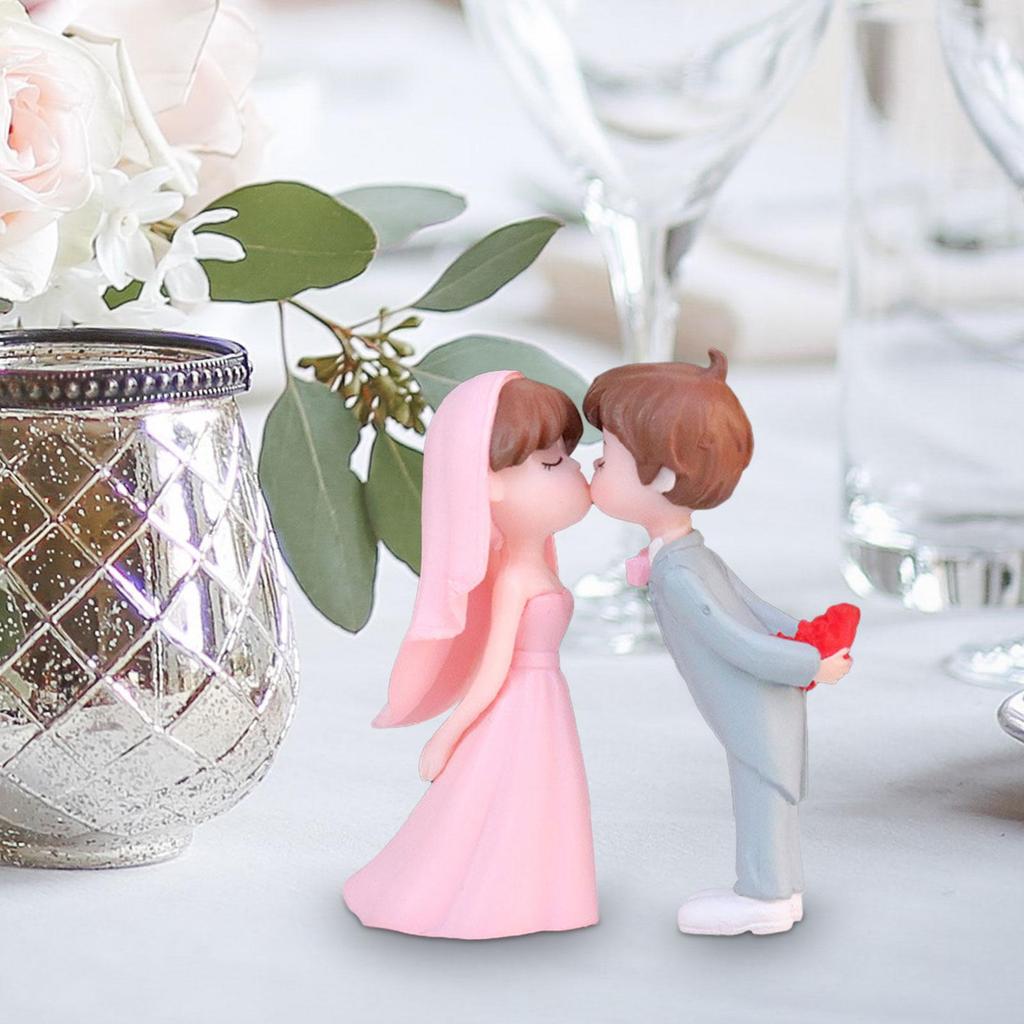Charming Wedding Cake Topper Featuring Miniature Bride and Groom