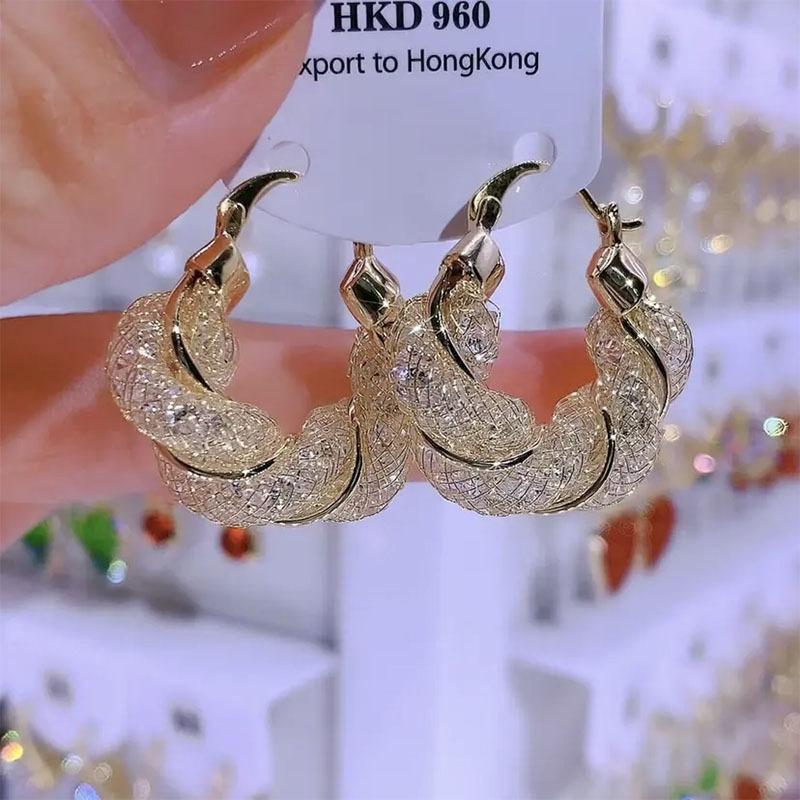 

Gold brushed earrings, metal ring earrings, women s niche design, light luxury high-end earrings, new popular models золотой