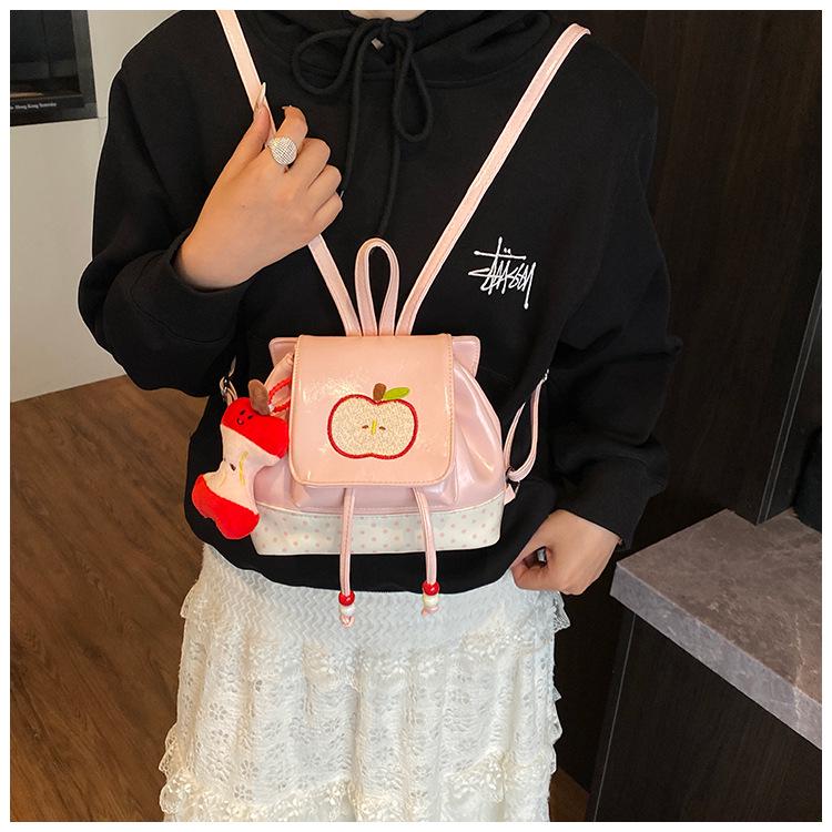 2025 Autumn Cute Apple Pendant Women's Lightweight Travel Backpack - Large Capacity, Casual Commuting Bag