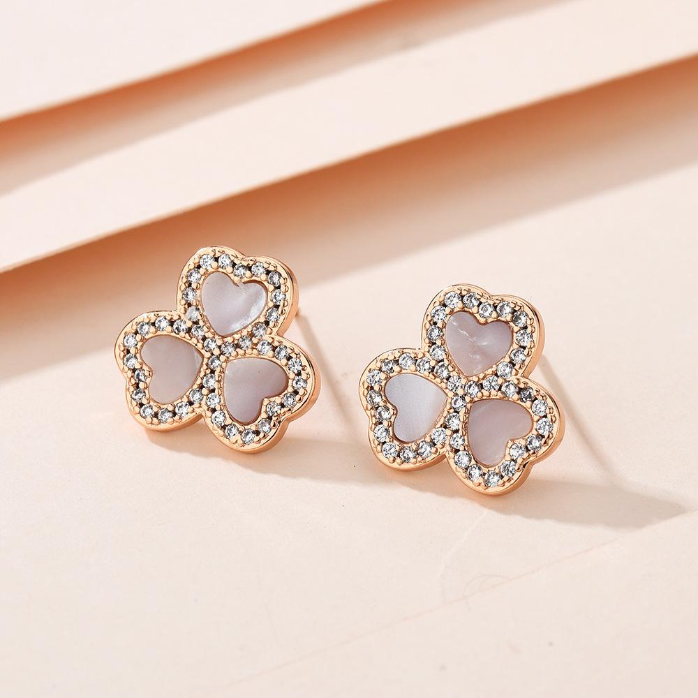 

New sweet peach heart white stud earrings, small earrings and ear jewelry.