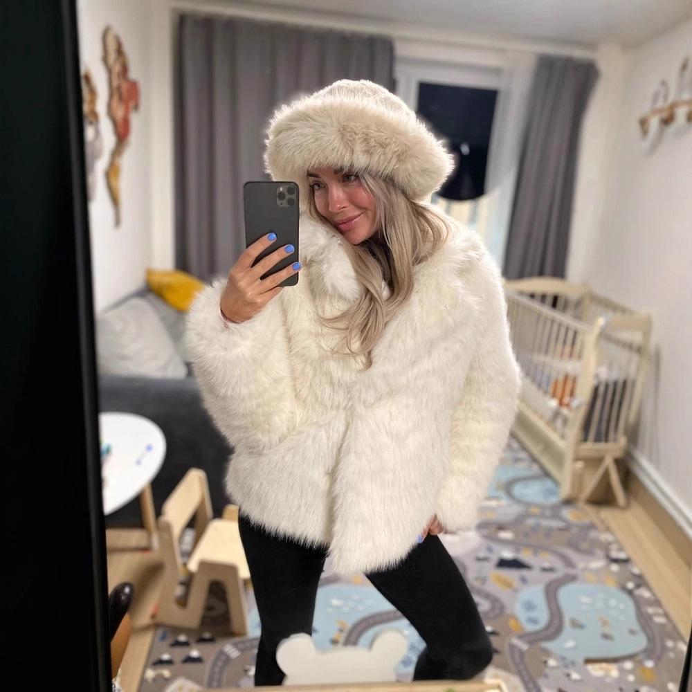 The new imitation fox fur coat is thin, fashionable medium and long, fluffy young environmentally friendly leather plush coat for women