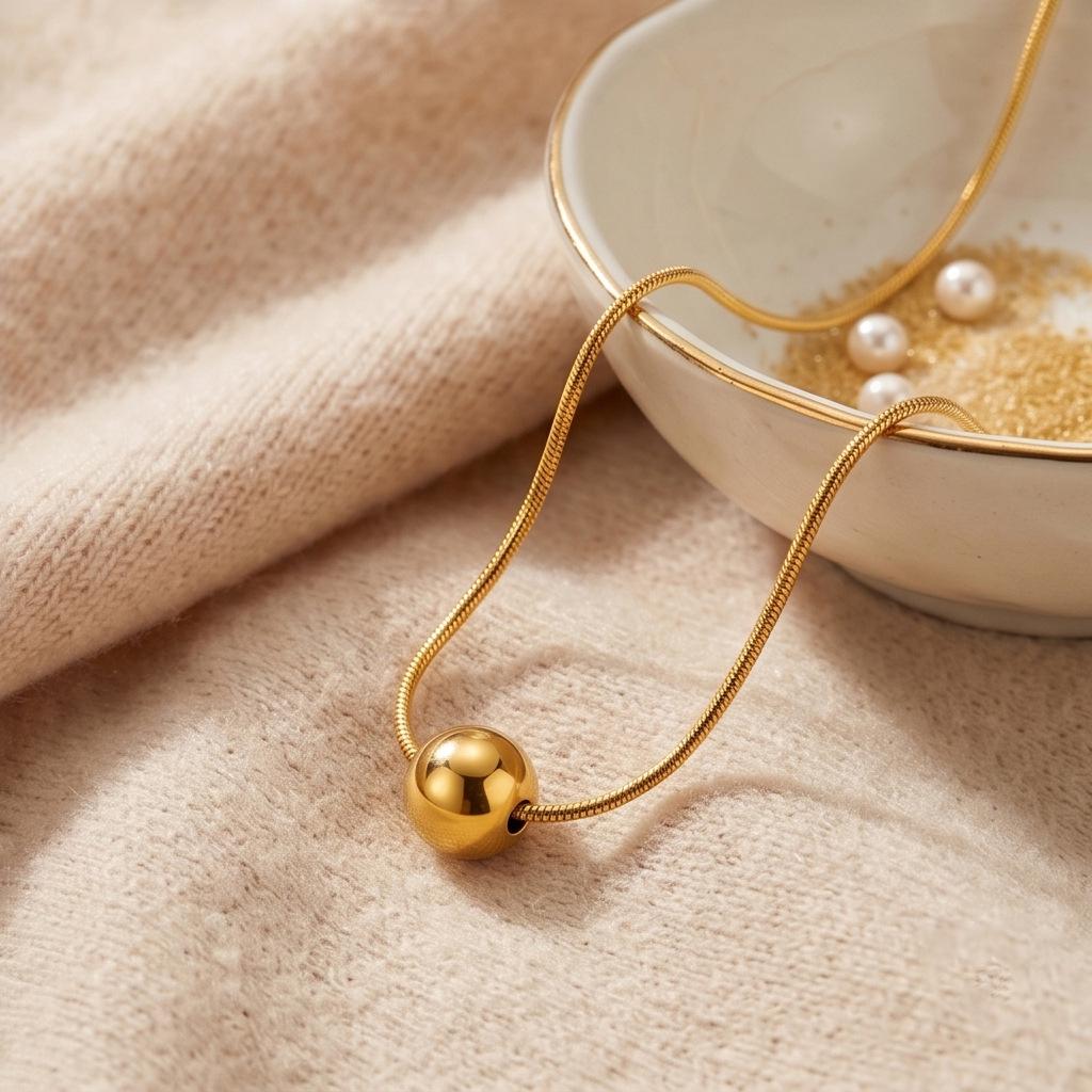 Gold Bean Pendant Necklace: Elegant Titanium Steel Chain for Women