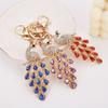 Seven-Color Peacock Tail Keychain: Creative Metal Pendant with Crystals