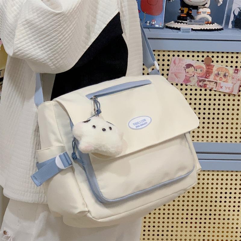 The New Schoolbag Is High-value, Fresh and Sweet, and the Candy-colored Satchel Is a Girl's Lightweight Spring Outing Large-capacity Messenger Bag.