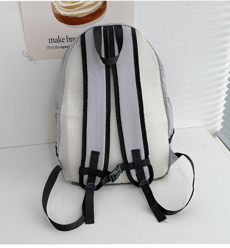 New Style Lightweight Backpack for Junior High Students - Unisex Double Shoulder Bag for Sports, Outdoor, and Mountaineering, Large Capacity.