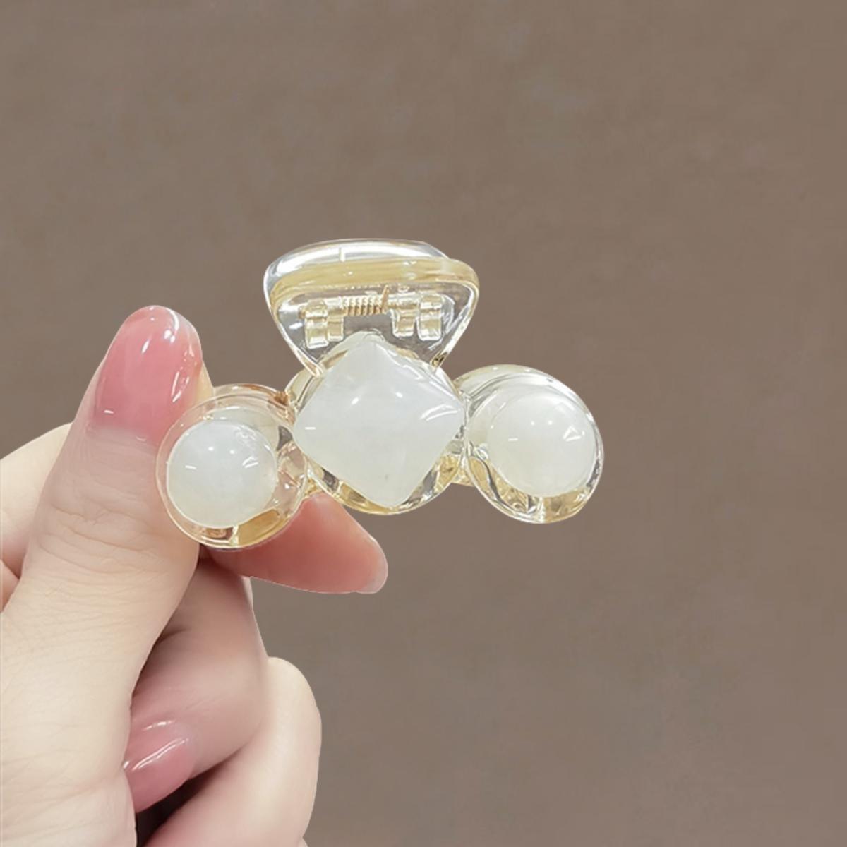 

Design sense, grab clip, small size, simple temperament, high ponytail hairpin, light luxury, half-tied hairpin on the back of the head