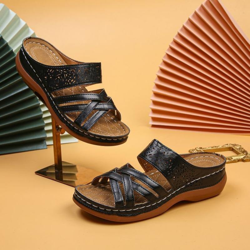 

New thick-soled hollow-out carved slippers women s slope heel open-toed beach shoes 35