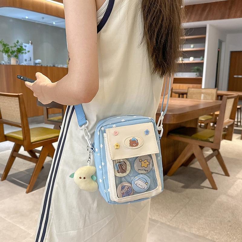 Japanese ins casual girl small bag, versatile messenger bag, cute transparent and painful bag, grain bag, mobile phone bag.