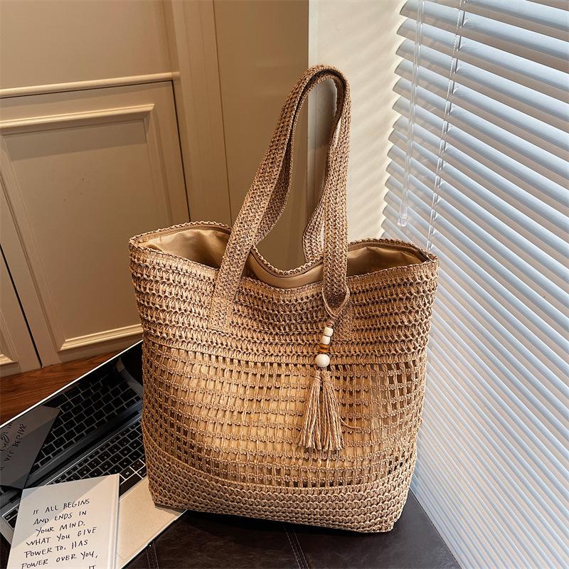 Woven Straw Tote with Tassel Accent and Spacious Interior for Summer Beach or Casual Daily Use