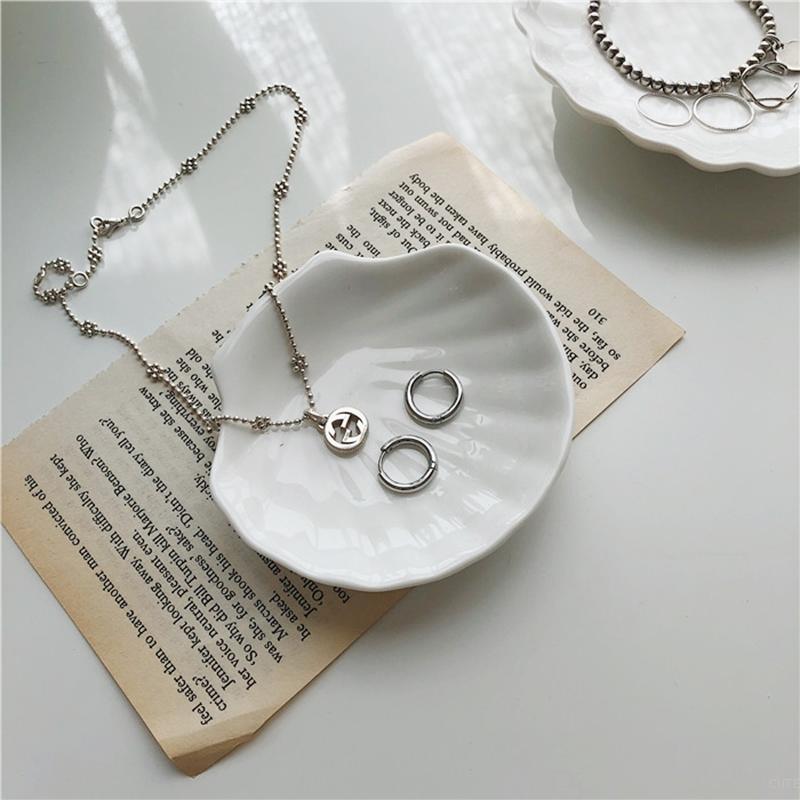 Muschelförmige Schmuckaufbewahrungsschalen Schalen Weiße Keramikplatte Aufbewahrungsschalen Ring Ohrringe Platte Heimdekoration Tablett Design