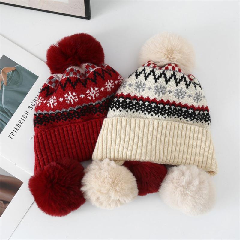 Autumn and winter jacquard knitted hat girls sweet hairball pullover hat piled and thickened Fair Island cold-proof ear protection wool hat