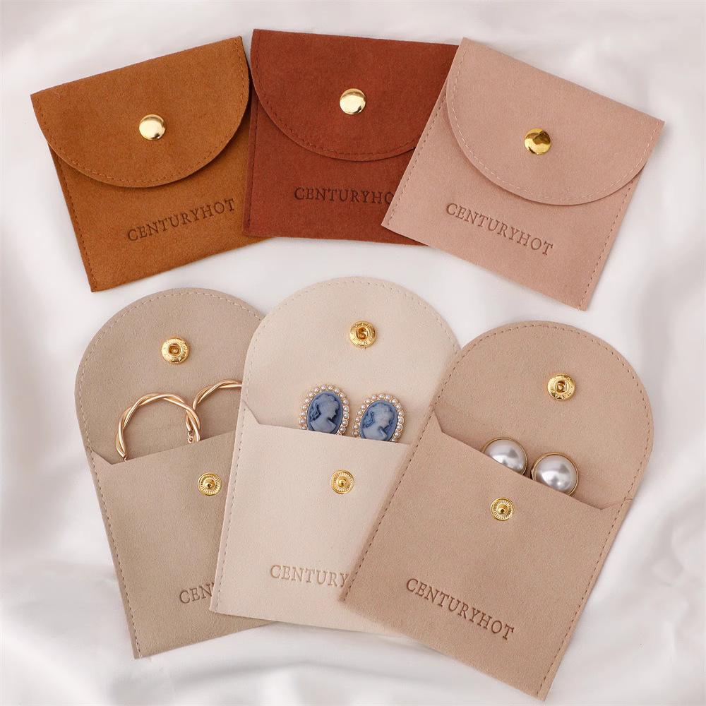 Luxury Microfiber Jewelry Bag with Snap Button for Necklaces, Rings, Earrings - Dustproof Accessory Storage.
