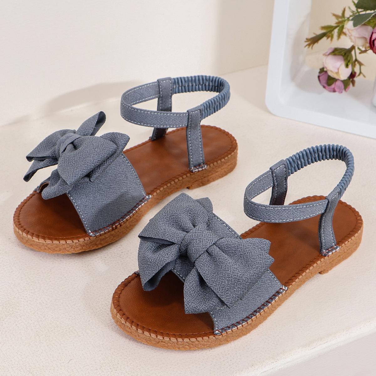 

Женские стильные розовые сандалии на плоской подошве с бантом — легкая повседневная летняя обувь с эластичной резинкой, без застежек и удобной резиновой подошвой 37 серый
