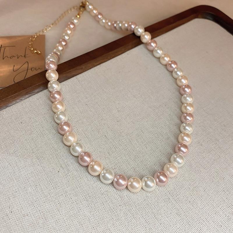 Fashion versatile color matching pearl necklace retro niche high-end sense collarbone chain personality light luxury design sense necklace women