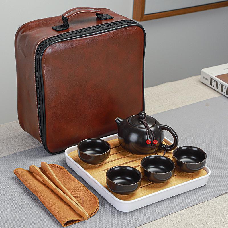 

Dehua Dingyao complete set of portable travel tea set, one pot and four cups of business simple office gifts