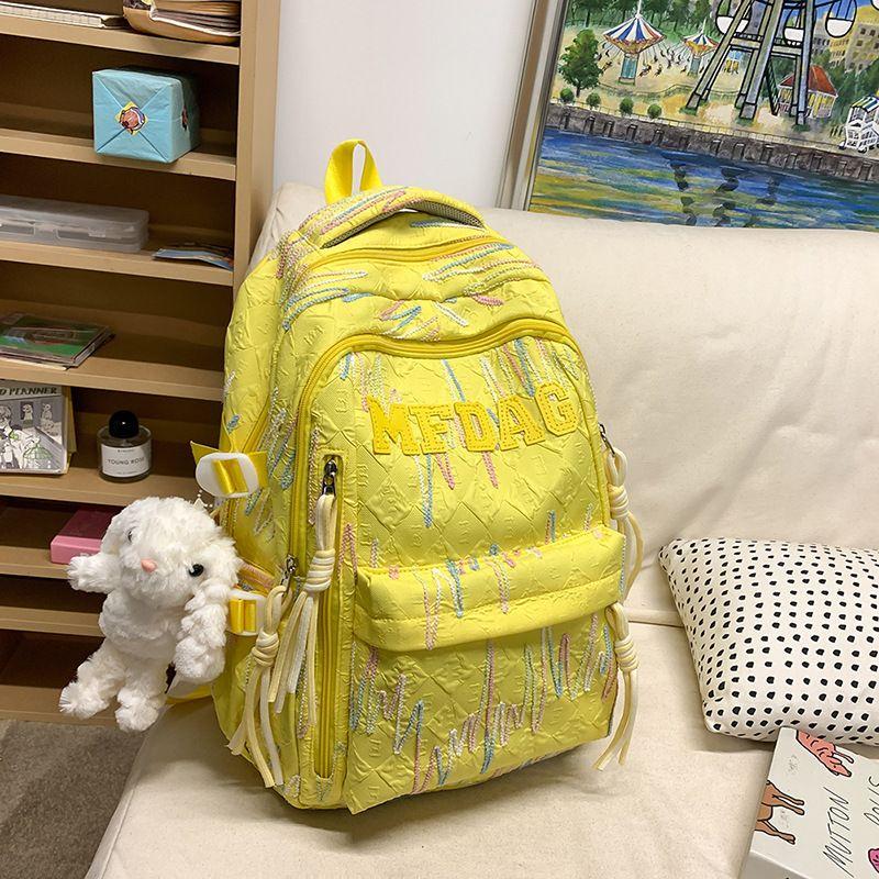 

Schoolbag Ins Niche Style Stain-Resistant Idle Style Schoolbag Junior High School Girls Good-looking Mixed Large Capacity Backpack Minimalist Yellow + pendant