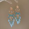 Retro ethnic style round hollow earrings Bohemian temperament elegant earrings niche fashion light luxury earrings women