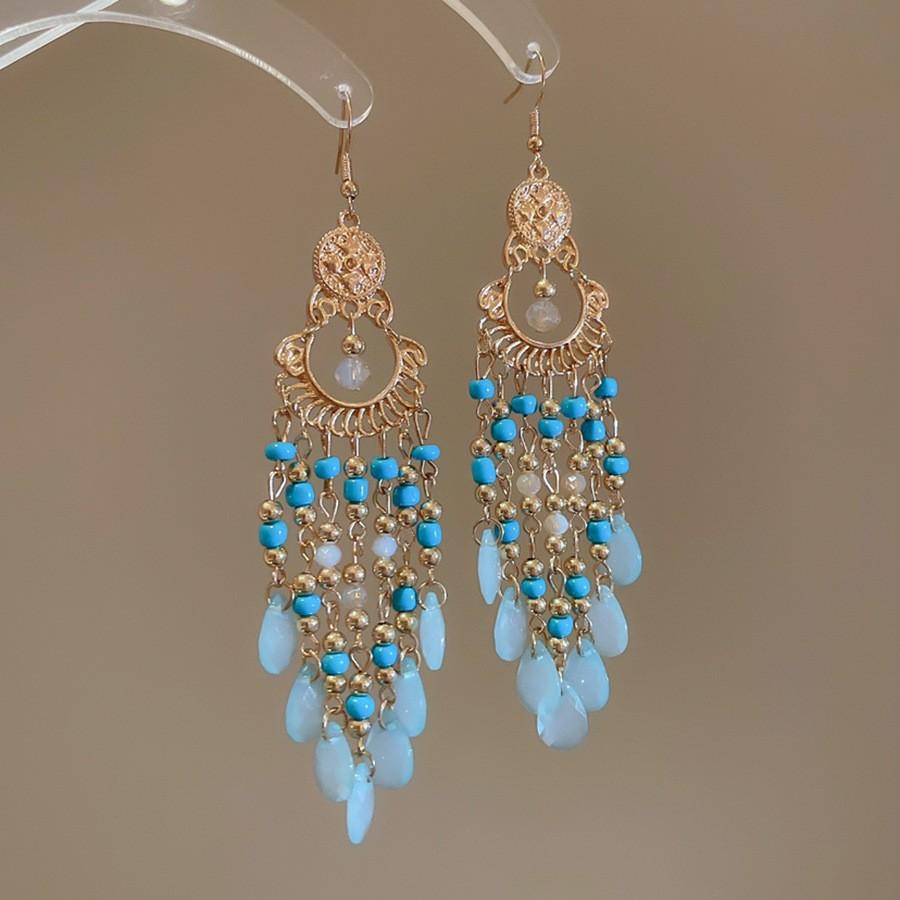 Retro ethnic style round hollow earrings Bohemian temperament elegant earrings niche fashion light luxury earrings women