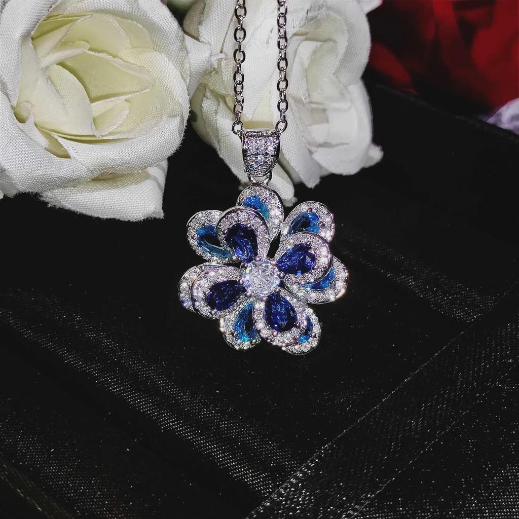 Farbenfrohe Zirkon Blumenohrringe und Kamelien Anhänger Ring Set