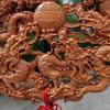 Nine Dragons Peach Wood Pendant: Hand-Carved Hanging Ornament for Home Entrance or Living Room Decor.