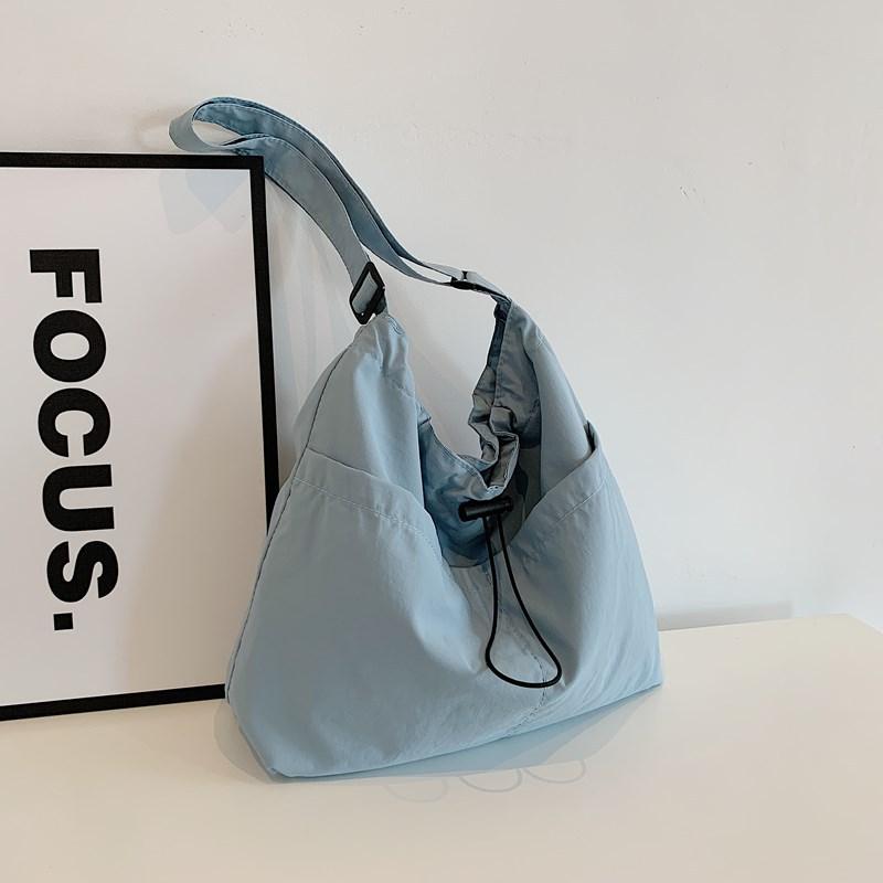 

Вместительная сумка-ведро на шнурке женская 2025 новая японская ins повседневная сумка-мессенджер уличная на плечо для поездок синий