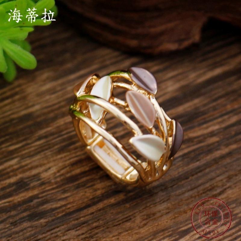 New Enamel Color Hollow Geometric Petal Elastic Ring Women's Simple High-end Flower Versatile Ring
