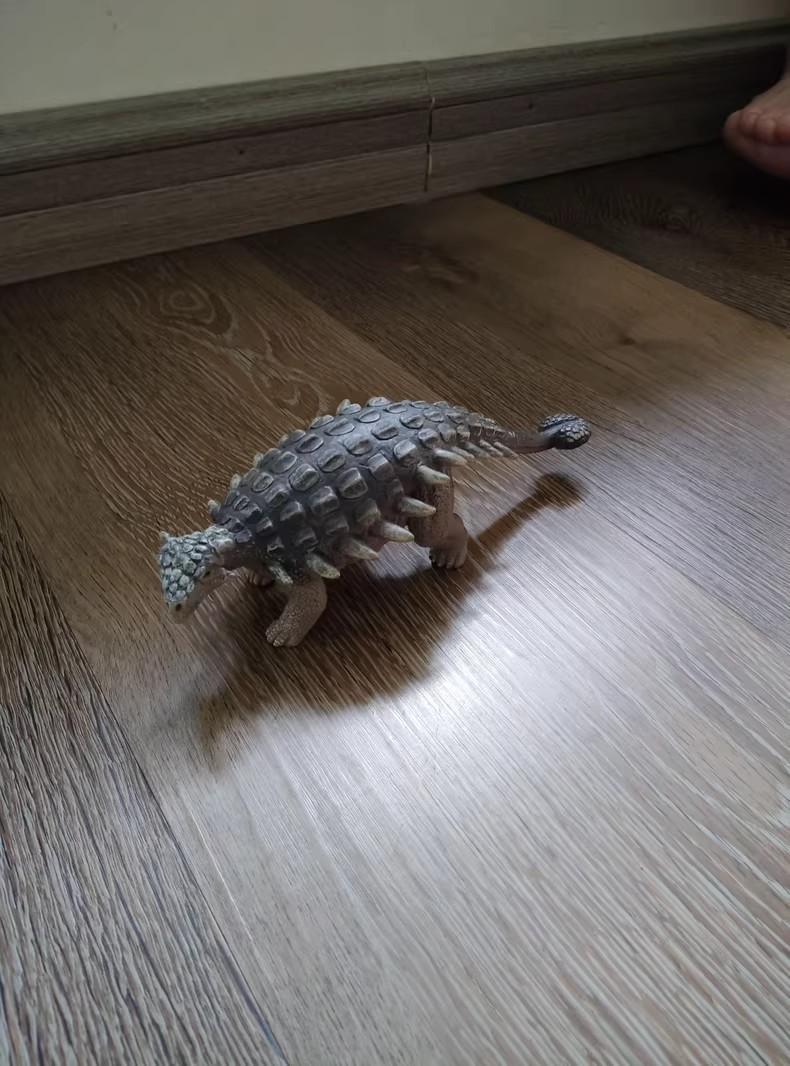 

[Б/У] Фигурка динозавра, серая, прибл.. 15см