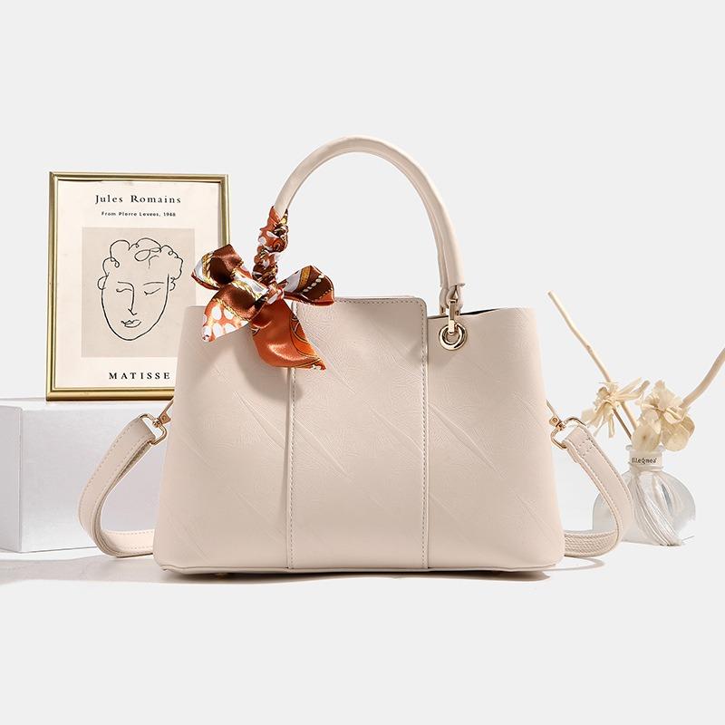 

Leather Mother s Day gift bag women s new portable oblique span bag light luxury fashion women s mother bag in the atmosphere