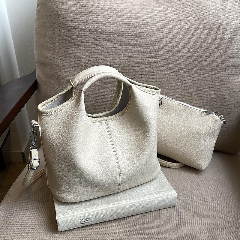 Retro work commuter bag women's large-capacity new casual versatile messenger bag women's hand-held child and mother bag