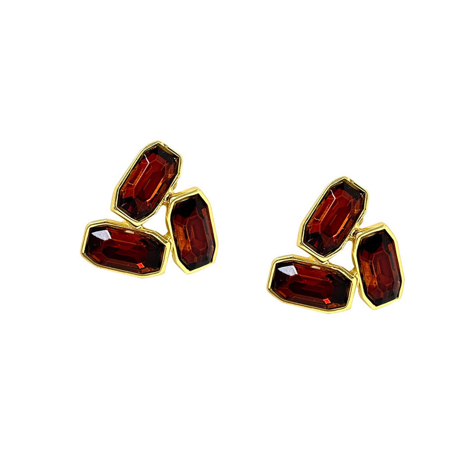 

Pair of Lightweight Triangle Earrings Adorned with Glistening Red Stones High Quality Metal Construction Easy to Carry Perfect for Casual or Formal 1
