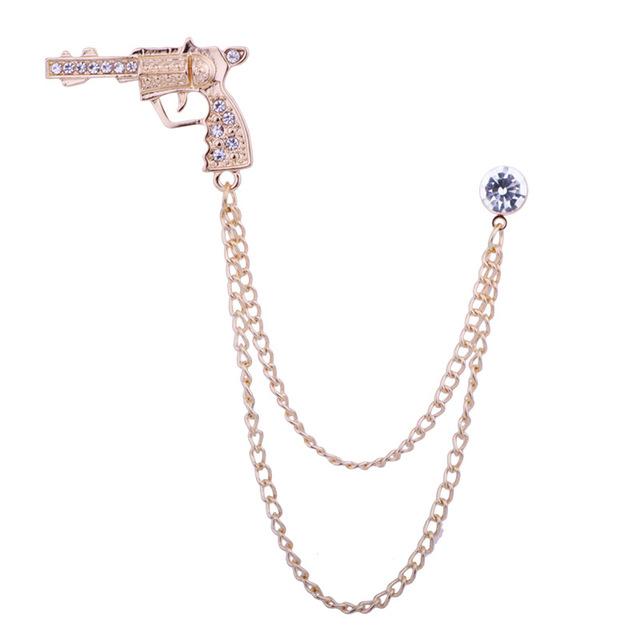 

Модная новая мужская брошь в виде пистолета со стразами и золотой цепочкой-кисточкой, броши-пистолеты, булавки, металлические булавки на лацкан, мужские аксессуары, ювелирные изделия