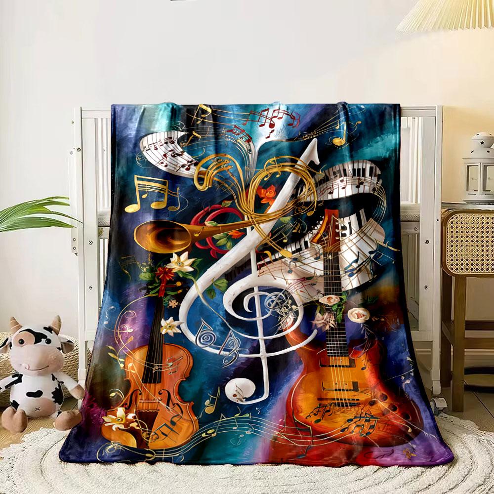 

A vibrant musical collage with instruments, notes, and floral accents. for all seasons blanket lunch break throw gift 80cm x 120cm