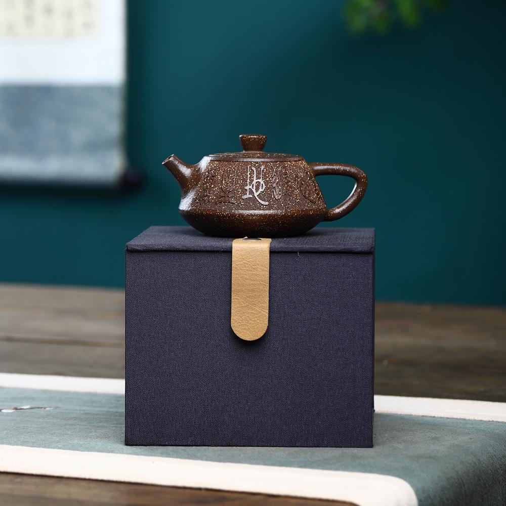 Yixing Master Zisha Stone Ladle Teapot: Handmade Gongfu Tea Set with Ancient Charm.