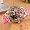 Orologio da polso da donna al quarzo con quadrante rotondo intarsiato di strass a forma di fiore e cinturino in ecopelle