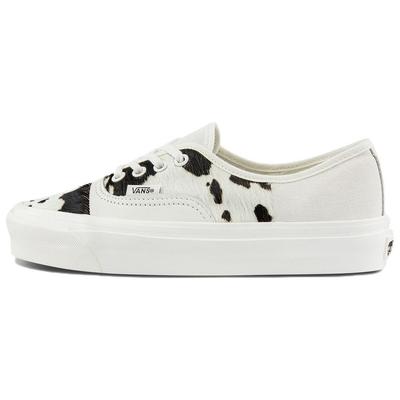 Style 44 Cow Print Low Top Skate Shoes Unisex Sneakers White Black VN0A54F9AXI