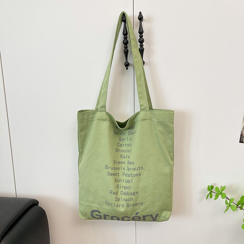 

Spring and summer new bag female student niche design 2025 shoulder foreign trend simple fashion casual cloth bag зелёный