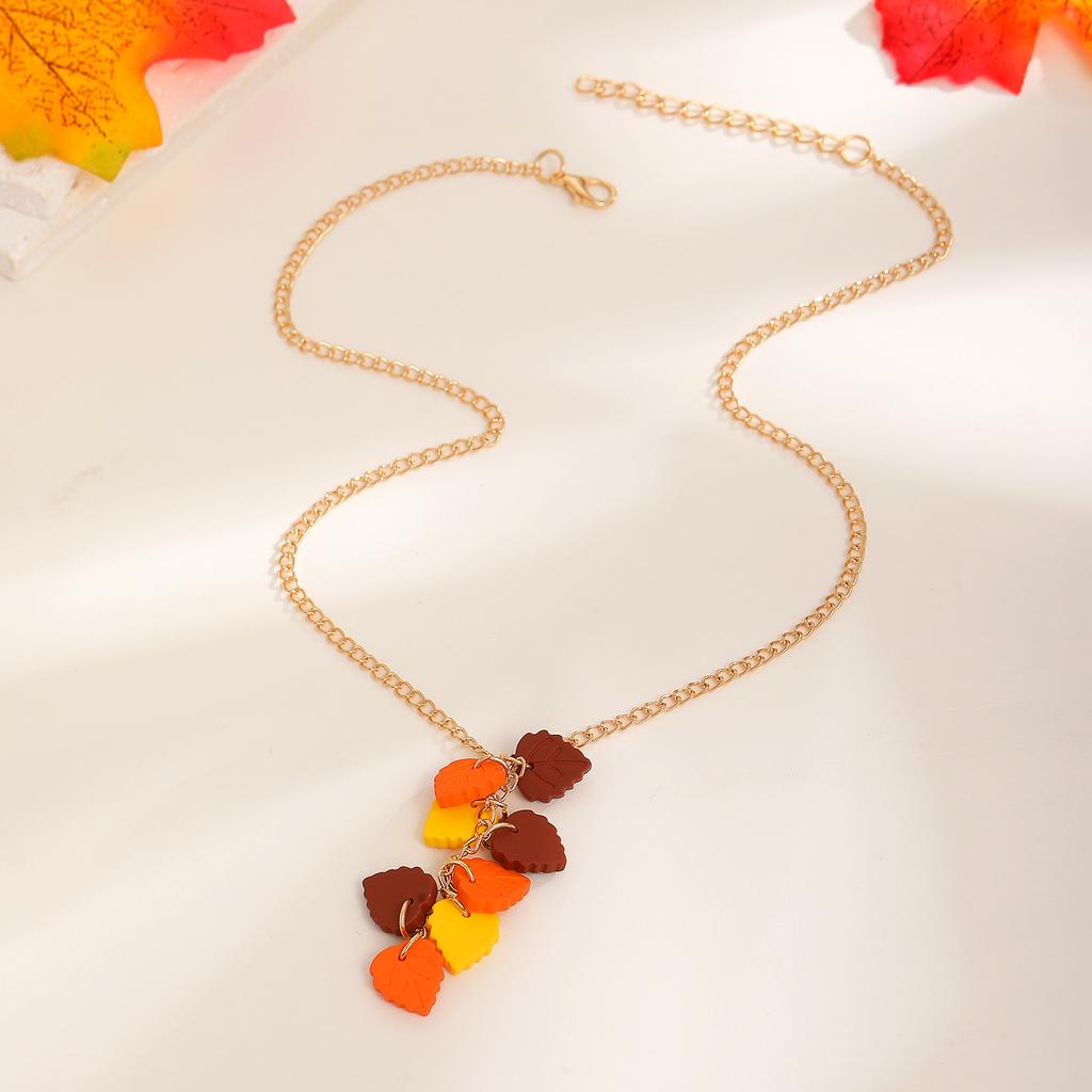 2026 Retro Red Zircon Maple Leaf Stud Earrings – Light Luxury Fashion Jewelry for Women