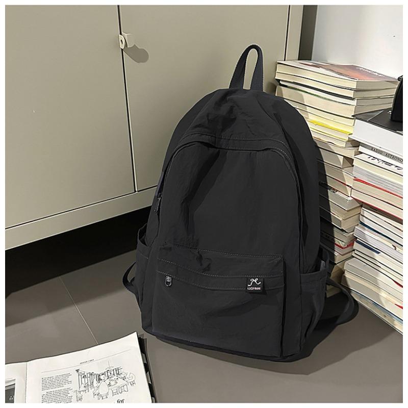 The new schoolbag is high-value, fresh and sweet, candy-colored backpack, lightweight and large-capacity backpack for junior high school students.